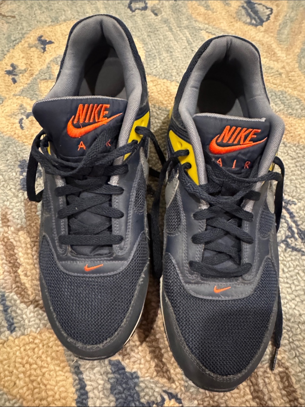 Nike Air Men’s Navy Sneakers with Yellow and Orange Accents